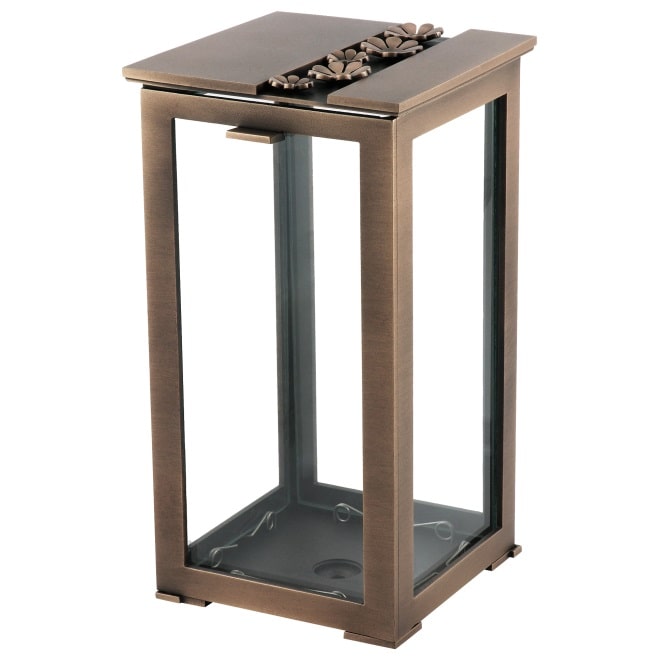 grablampe-blumenrelief-bronze Grablampe mit Blumenrelief aus Bronze